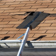 Tile replacement for sagging roof