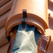 Roof flashing deterioration on a residential tile roof in Mesa